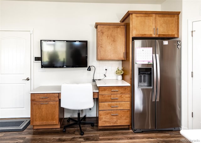 4330 Prairie Agate Dr, Colorado Springs, CO 80938 - home office featuring dark wood-style floors and built in desk