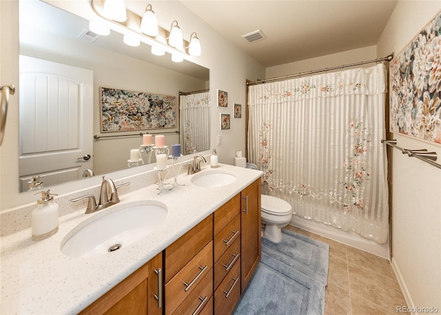 4330 Prairie Agate Dr, Colorado Springs, CO 80938 - full bathroom featuring double vanity, tile patterned floors, and shower / bath combo with shower curtain