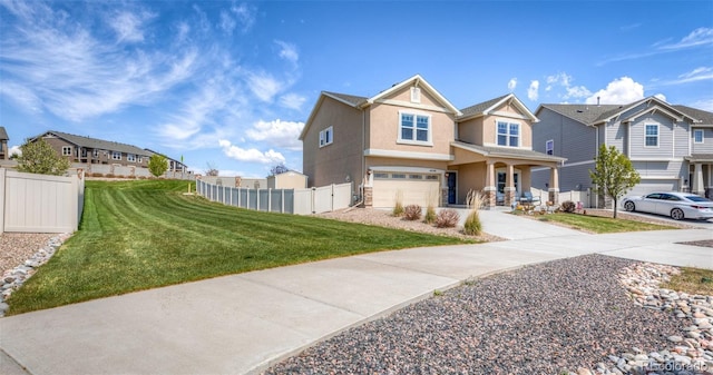 4330 Prairie Agate Dr, Colorado Springs, CO 80938 - view of front of property with concrete driveway, stucco siding, a garage, and a residential view