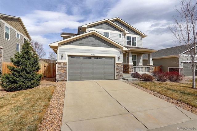 2033 E 167th Way, Thornton, CO 80602 - craftsman-style house with stone siding, covered porch, concrete driveway, and board and batten siding