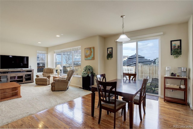 2033 E 167th Way, Thornton, CO 80602 - dining space featuring wood finished floors, recessed lighting, and baseboards