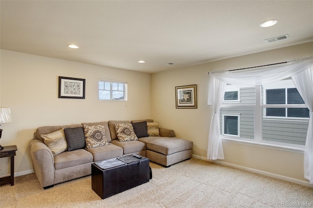 2033 E 167th Way, Thornton, CO 80602 - living room featuring light colored carpet, recessed lighting, and baseboards