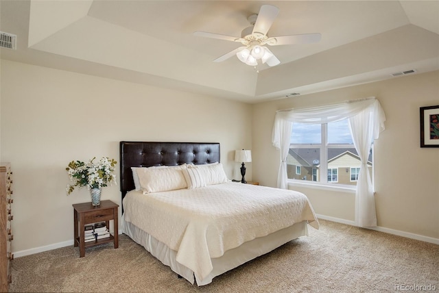 2033 E 167th Way, Thornton, CO 80602 - bedroom with light colored carpet, a raised ceiling, and baseboards
