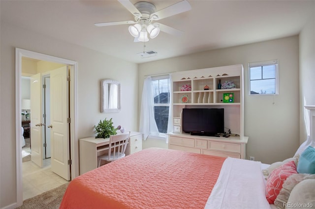 2033 E 167th Way, Thornton, CO 80602 - bedroom with ceiling fan and light tile patterned floors
