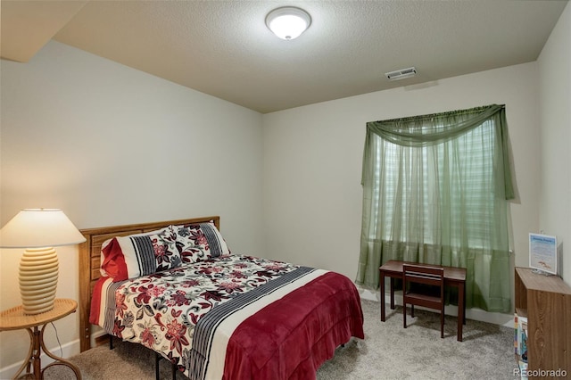 2033 E 167th Way, Thornton, CO 80602 - carpeted bedroom with a textured ceiling and baseboards