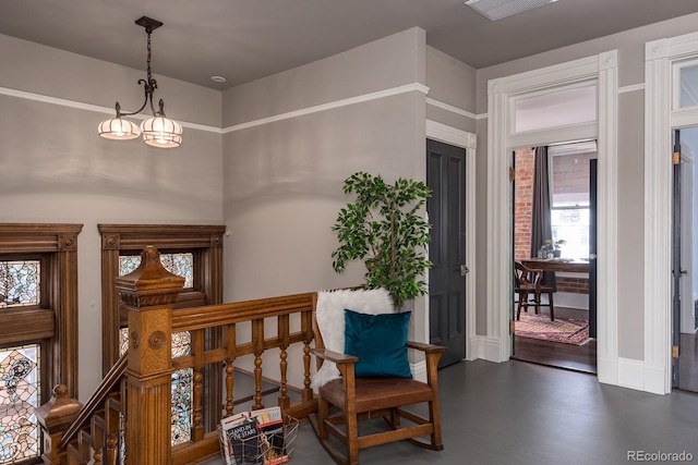 131 N Sherman St, Denver, CO 80203 - living area featuring an upstairs landing and baseboards