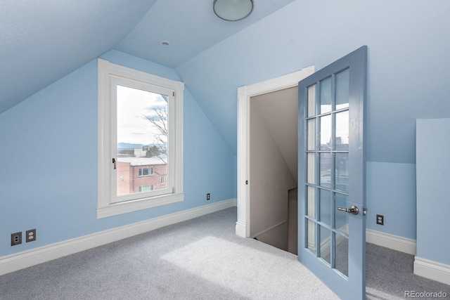 131 N Sherman St, Denver, CO 80203 - additional living space featuring lofted ceiling, carpet flooring, french doors, and baseboards