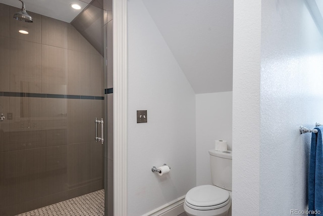 131 N Sherman St, Denver, CO 80203 - bathroom featuring lofted ceiling, toilet, a shower stall, and tile patterned floors