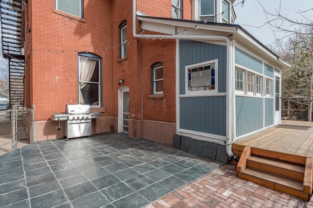 131 N Sherman St, Denver, CO 80203 - view of patio featuring a grill and fence