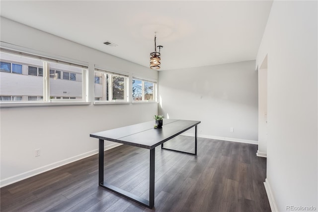 2314 S Troy St, Aurora, CO 80014 - unfurnished dining area featuring dark wood finished floors