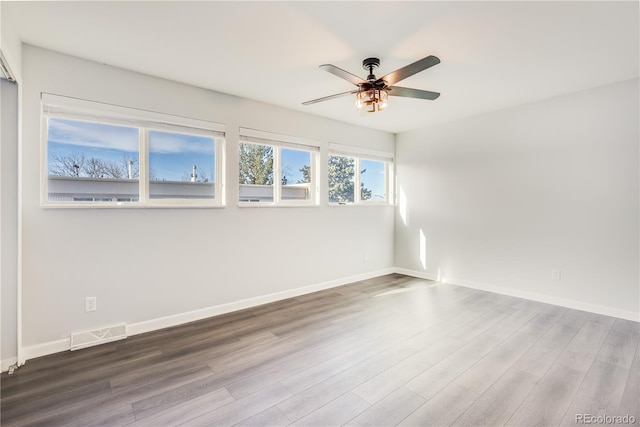 2314 S Troy St, Aurora, CO 80014 - empty room with wood finished floors and ceiling fan