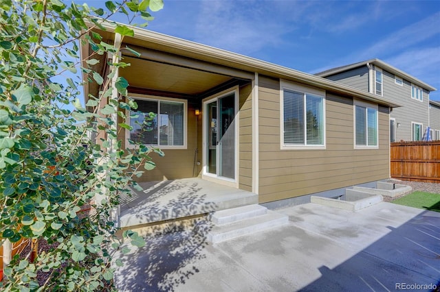 rear view of house featuring a patio area