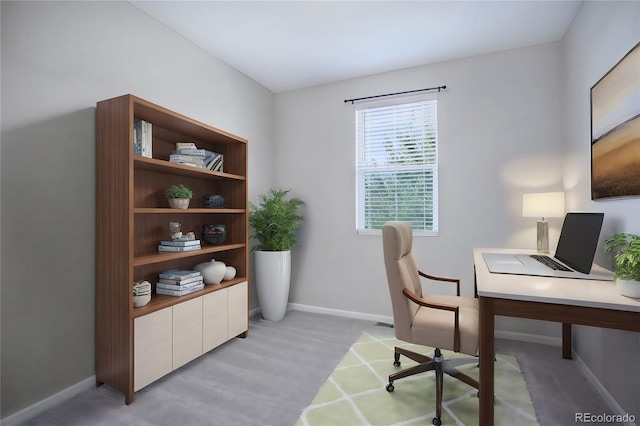 office space with light colored carpet and baseboards