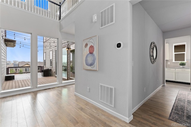 18815 W 93rd Ave, Arvada, CO 80007 - entrance foyer with wood finished floors and a towering ceiling