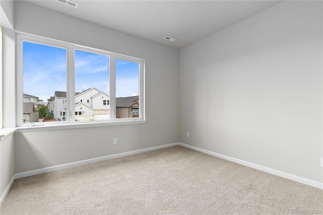 18815 W 93rd Ave, Arvada, CO 80007 - spare room with carpet and a residential view