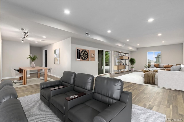 18815 W 93rd Ave, Arvada, CO 80007 - living room featuring wood finished floors and recessed lighting