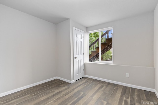 18815 W 93rd Ave, Arvada, CO 80007 - unfurnished room with wood finished floors and baseboards