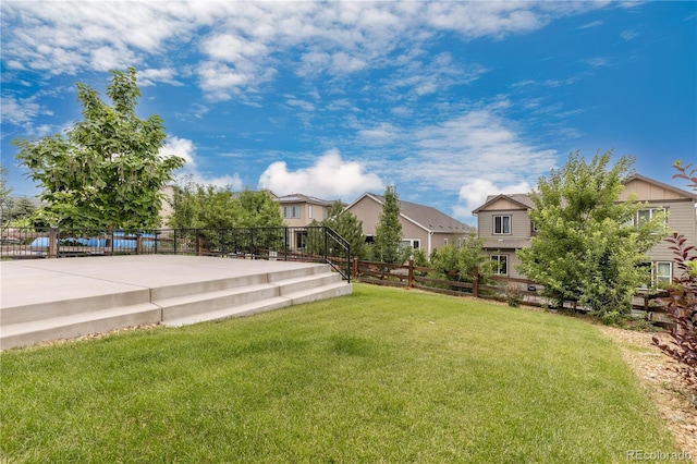 18815 W 93rd Ave, Arvada, CO 80007 - view of yard featuring a patio and a residential view