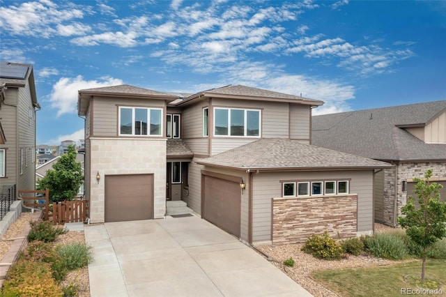 18815 W 93rd Ave, Arvada, CO 80007 - prairie-style house with a garage, stone siding, concrete driveway, and a shingled roof
