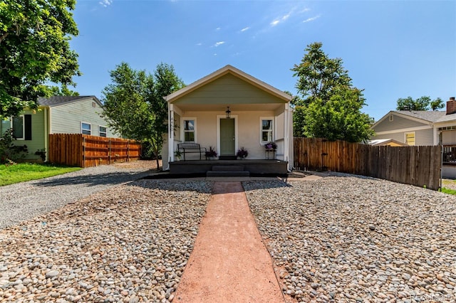 4450 S Fox St, Englewood, CO 80110 - bungalow featuring a porch