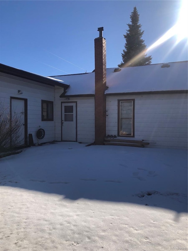 back of property featuring a patio area