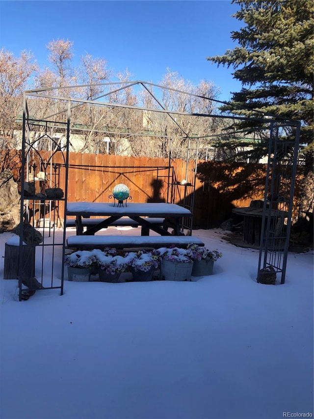 view of yard covered in snow