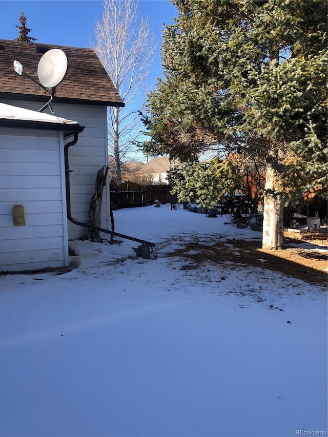 view of snowy yard