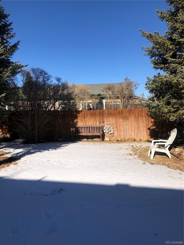 view of snowy yard