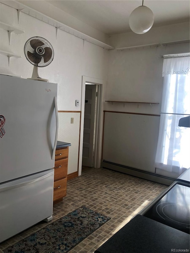 kitchen featuring white refrigerator