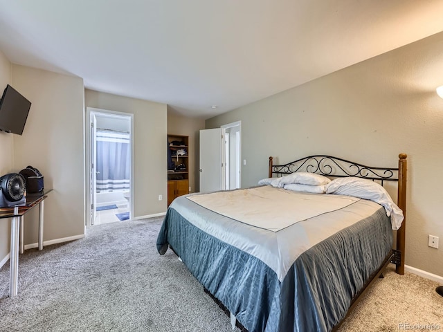 4935 E 100th Dr, Thornton, CO 80229 - bedroom with light colored carpet and ensuite bath