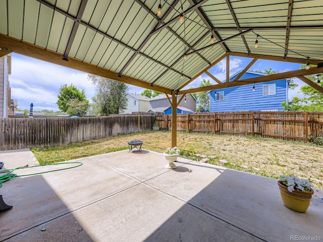 4935 E 100th Dr, Thornton, CO 80229 - fenced backyard with a patio area
