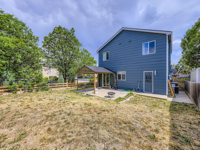 4935 E 100th Dr, Thornton, CO 80229 - rear view of house featuring a gazebo, a patio area, and a fenced backyard