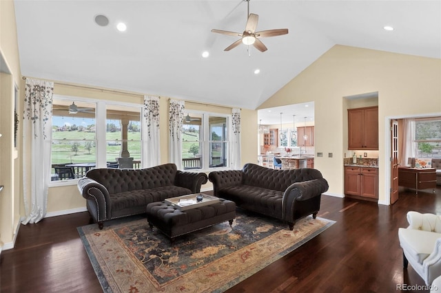 11208 W Ontario Ave, Littleton, CO 80127 - living area with a ceiling fan, dark wood finished floors, plenty of natural light, high vaulted ceiling, and recessed lighting