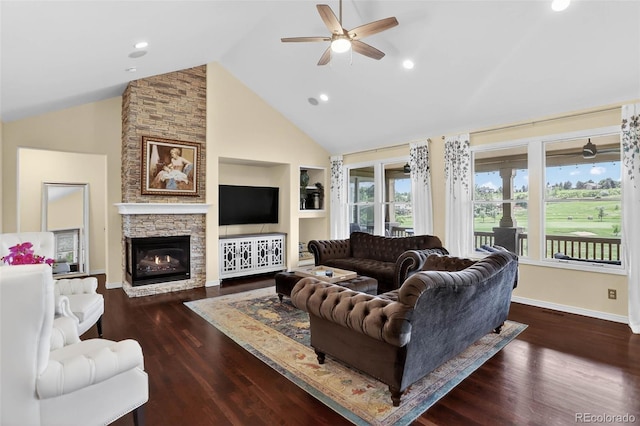 11208 W Ontario Ave, Littleton, CO 80127 - living room with ceiling fan, wood finished floors, a fireplace, high vaulted ceiling, and recessed lighting