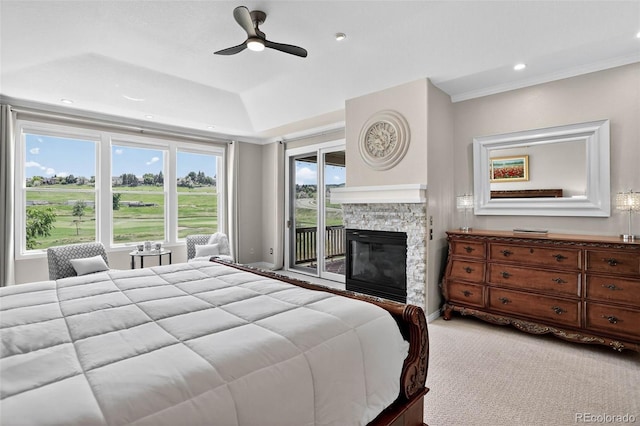 11208 W Ontario Ave, Littleton, CO 80127 - bedroom featuring access to outside, carpet flooring, a stone fireplace, ceiling fan, and a raised ceiling