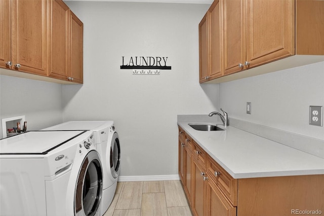 11208 W Ontario Ave, Littleton, CO 80127 - laundry area featuring cabinet space and washing machine and clothes dryer