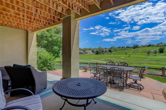 11208 W Ontario Ave, Littleton, CO 80127 - view of patio / terrace with golf course view and outdoor dining space