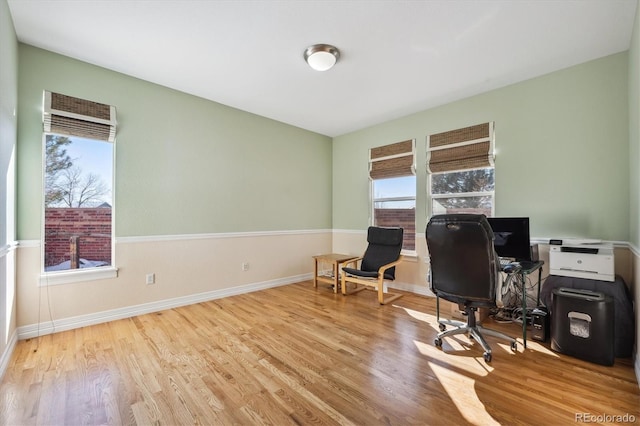 office space with light hardwood / wood-style floors