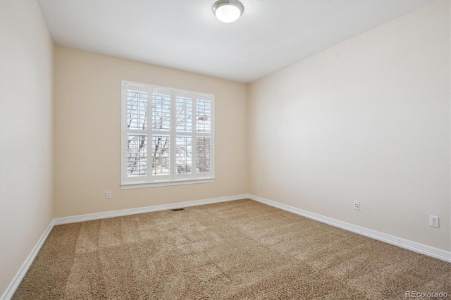 view of carpeted spare room