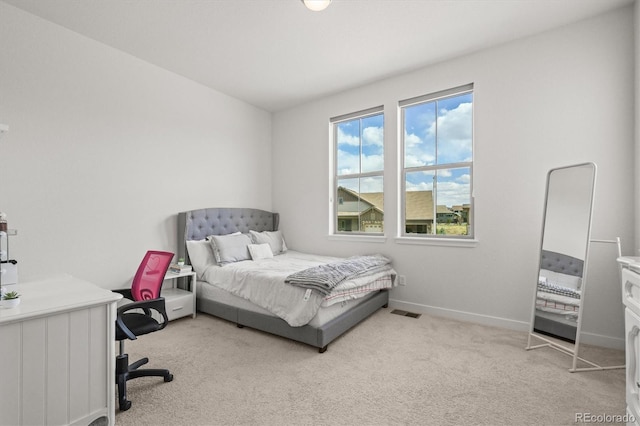 8023 Gore Creek Ln, Littleton, CO 80125 - bedroom with light colored carpet, baseboards, and a desk