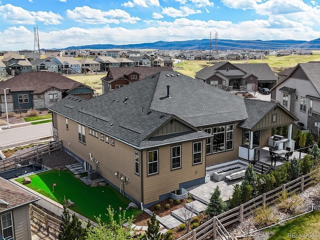 8023 Gore Creek Ln, Littleton, CO 80125 - aerial view of residential area with a mountainous background