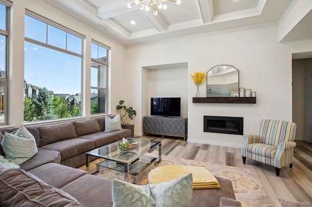 8023 Gore Creek Ln, Littleton, CO 80125 - living area with wood finished floors, coffered ceiling, beam ceiling, a chandelier, and ornamental molding