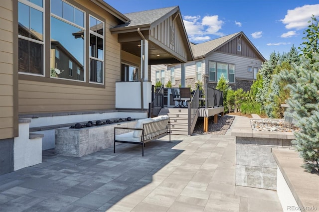8023 Gore Creek Ln, Littleton, CO 80125 - view of patio / terrace featuring an outdoor fire pit