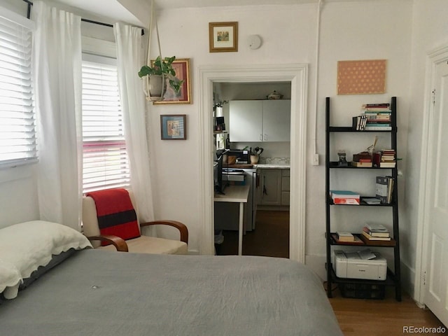 bedroom with wood finished floors