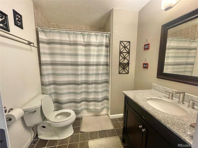 13660 Monroe St, Thornton, CO 80602 - full bath featuring tile patterned floors, vanity, a textured ceiling, and a shower with curtain