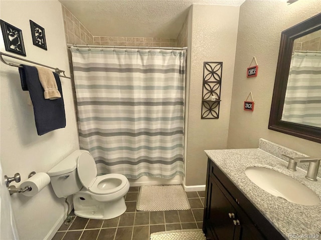 13660 Monroe St, Thornton, CO 80602 - bathroom featuring tile patterned floors, vanity, a textured ceiling, and a shower with curtain