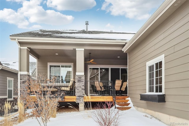 exterior space featuring ceiling fan and covered porch