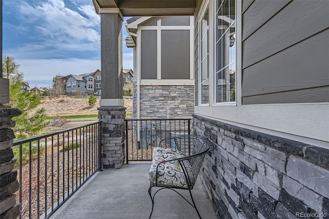 balcony featuring a residential view