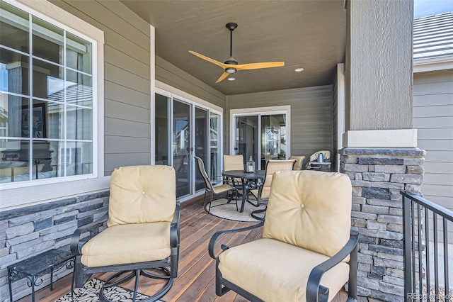 exterior space with ceiling fan