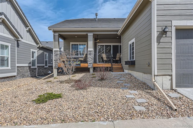 exterior space featuring a ceiling fan and covered porch